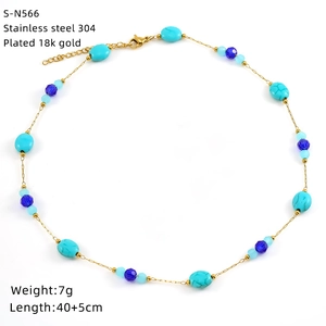 Close-up of 18k gold plated stainless steel necklace with turquoise and blue glass beads