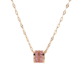 Elegant rose gold necklace with a pink rectangular gemstone and golden bead cylinder pendant