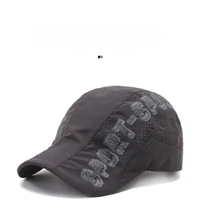 Detail of laser-cut ventilation holes and SPORT print on a quick-dry mesh flat cap