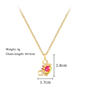 Detail view of colorful crystal crab pendant with dimensions 2.8cm by 1.7cm and chain specs