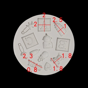 Detailed view of silicone mold with baby icons and dimensions for cake decorating