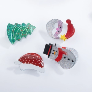 Christmas hair clips set featuring Santa, tree, and snowman with glitter finish