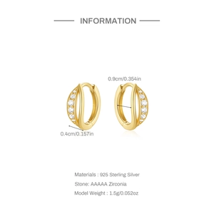 Detail view of 925 sterling silver huggie earrings with gold finish and zircon stones