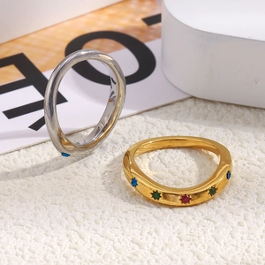 18K gold plated stainless steel star rings set with colorful diamonds on minimalist stand