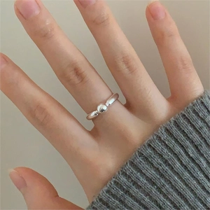 Minimalist 925 sterling silver beaded open ring shown on a finger with a cozy lifestyle vibe
