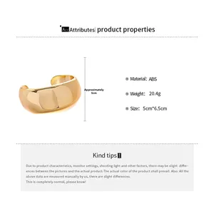 Detailed specs of the chunky gold-finished ABS bangle showing size and weight info