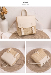 Detailed view of woven straw backpack with white leather straps and gold metal buckles
