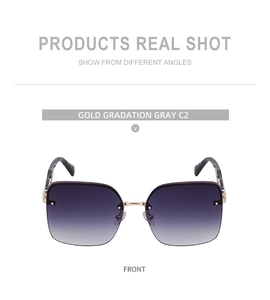 Front view of large square gold metal sunglasses with purple-gray gradient lenses