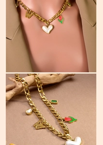Detailed close-up of 18K gold-plated chunky chain with mixed heart and butterfly charms
