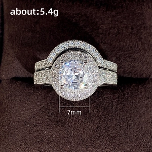 Two-piece silver set of rings with micro-set zircons and a 7mm round center stone