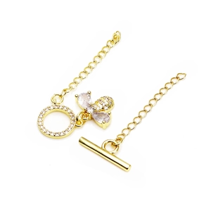 Macro view of gold plated bee toggle clasp with micro paved zircons for DIY jewelry