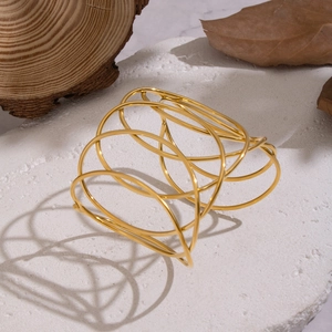 Modern minimalist 18K gold-plated open cuff bracelet with interwoven line design for women