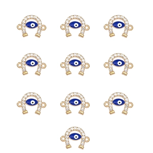 Macro view of 10pcs gold horseshoe evil eye connectors with crystals for DIY jewelry