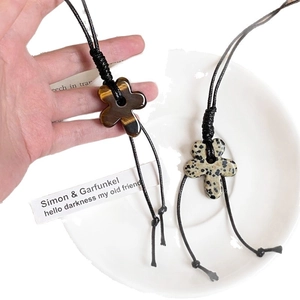 Tiger eye and dalmatian jasper flower pendants on adjustable wax rope necklaces