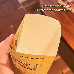 Handheld Christmas paper bag with oil-proof coating and festive cartoon patterns
