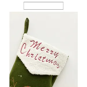 Green felt Christmas stocking with Merry Christmas embroidery and white fleece cuff