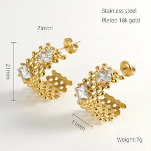 Detail of 18k gold plated stainless steel C-shaped earrings with square zircon stone