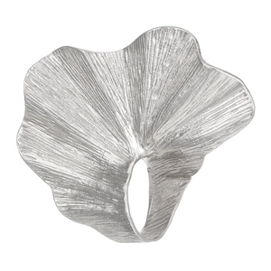 Macro shot of silver textured ginkgo leaf ring showing artistic irregular fan shape details