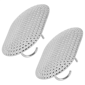 Detailed view of silver stainless steel geometric earrings with textured honeycomb finish