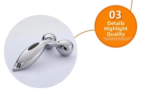 Detail view of the Y-shaped 3D facial roller massager with silver diamond-cut texture surface
