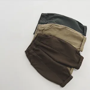 Three-pack kids fleece-lined pants in dark green, khaki, and brown with elastic waist