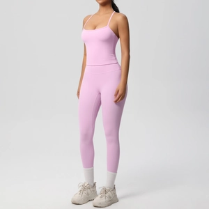 Side view of a pink high-waist yoga set with a tight-fitting tank top and leggings