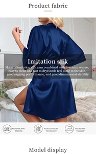 Detail showing smooth satin texture and fabric care instructions of the blue bathrobe