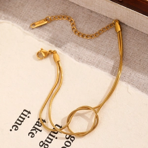 Minimalist gold-plated double-layer snake chain bracelet with a knot ring design