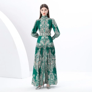 Vintage emerald green long-sleeve maxi dress with bohemian paisley patterns and belt