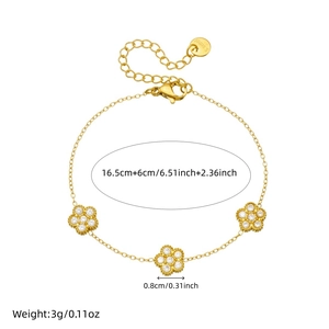 Élégant bracelet fleurs en acier inoxydable plaqué or avec cristaux blancs pour femmes
