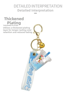 Detail of creative bubble tea keychain with unicorn figurine and blue liquid inside