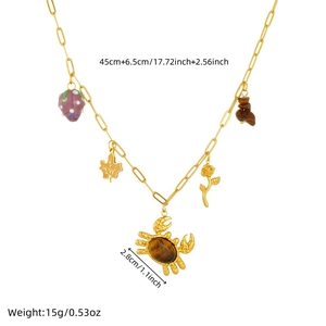Vintage gold plated stainless steel necklace with crab tiger eye and maple leaf charms