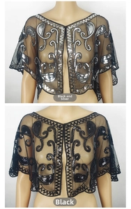 Detail view of mesh shawl with black and silver sequins featuring vintage floral patterns