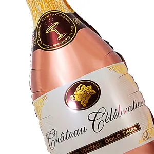 Rose gold champagne bottle foil balloon with Château Célébration text for party decor