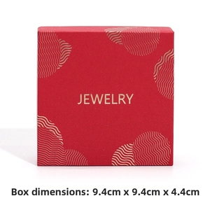 Detail view of 9.4cm red jewelry gift box with gold wave pattern and jewelry text