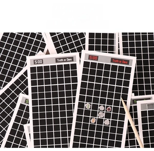 Detail of Truth or Dare scratch cards with 5:00 countdown and black grid design