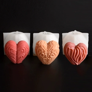 Detail view of 3D heart silicone molds with embossed texture for DIY candle making