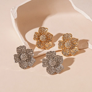 Luxury crystal flower stud earrings in gold and silver finish with sparkling petals