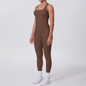 Side view of dark brown two-piece yoga set with square neck tank top and leggings