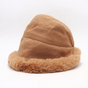 Detail of brown suede bucket hat featuring thick faux fur trim for winter warmth