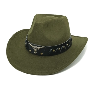 Detail of olive green cowboy hat showing black leather band with metal bull head buckle