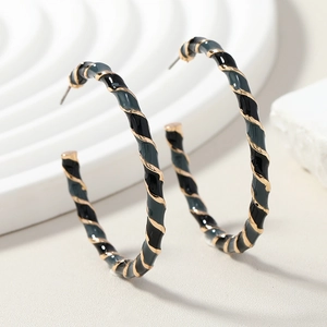 Fashionable golden spiral hoop earrings with black and grey drip oil finish for women