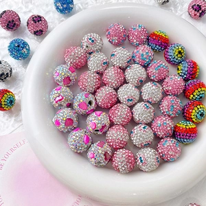 Sparkly rhinestone clay beads for DIY jewelry making in pink and rainbow gradient colors