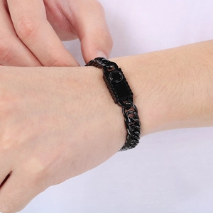 Hip hop style black curb chain bracelet with rectangular plate on male wrist