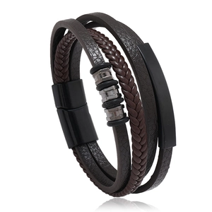 Men's multilayer braided leather bracelet with black magnetic alloy clasp on white background