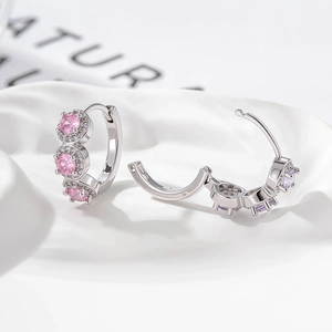 Minimalist geometric copper hoop earrings with three pink stones and white zircons