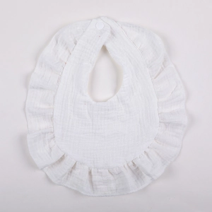 Detailed view of white double-layer cotton gauze baby bib with ruffled edge and snap button