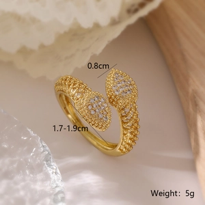 Macro view of gold snake-shaped ring with zircon leaves and size dimensions details