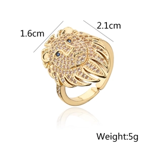 Detail view of gold-plated lion head ring with dimensions 1.6cm x 2.1cm and 5g weight