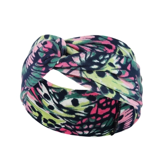 Detailed view of colorful butterfly print fabric on soft elastic yoga headband